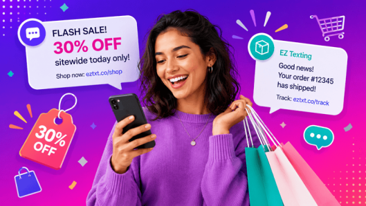 An eCommerce shopper smiling at her phone with shopping bags, receiving SMS promotions from EZ Texting: a flash-sale 30 percent off discount and an order-shipped update.