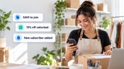 Small business owner checking new SMS opt-in alerts on her phone